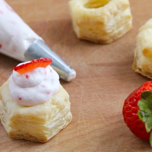 Strawberry cream puff pastry cups photo