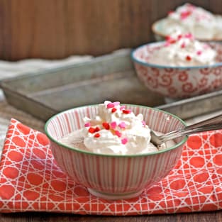 White chocolate pudding with strawberry jam photo