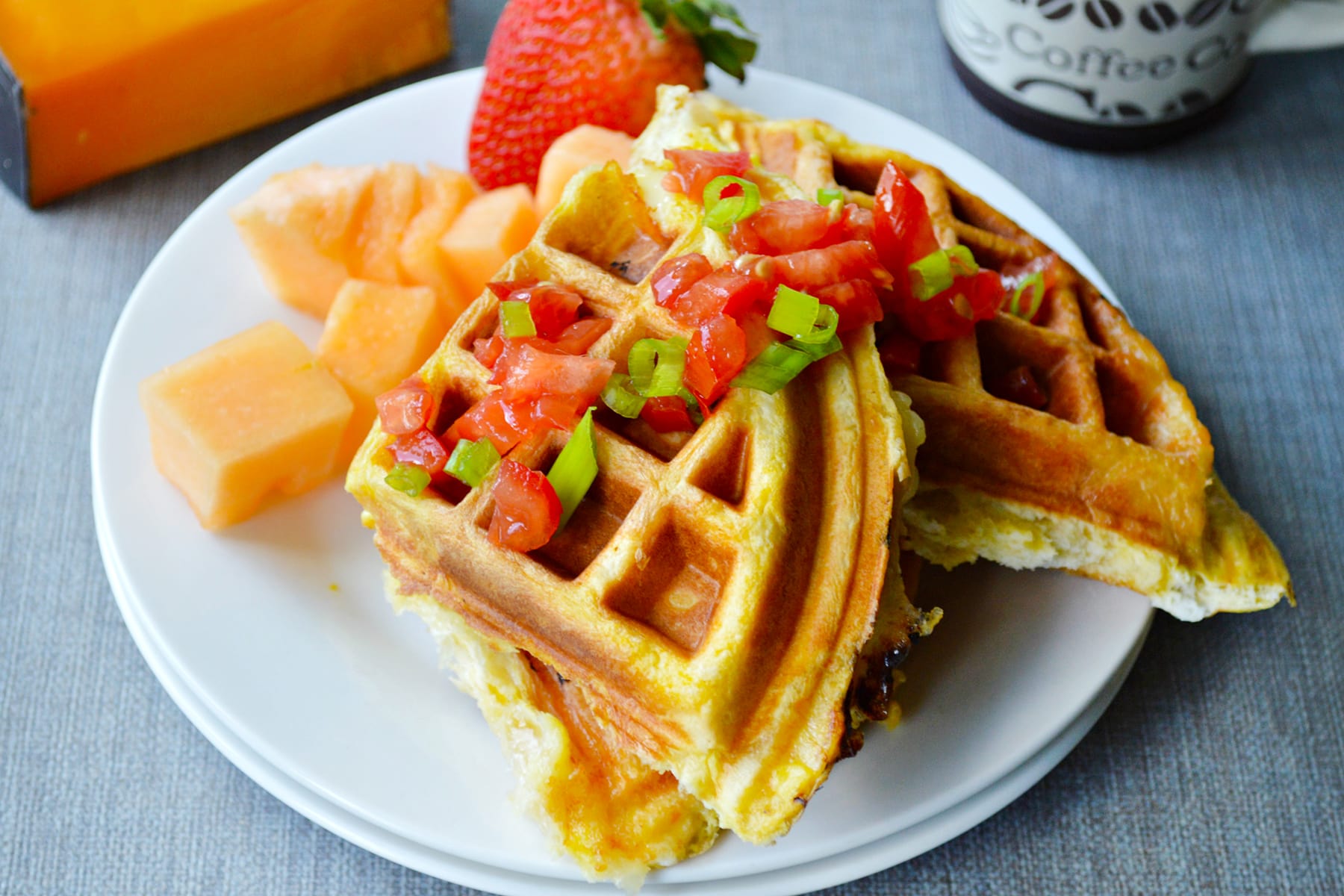 https://food-fanatic-res.cloudinary.com/iu/s--93IfpVjm--/f_auto,q_auto/v1469281673/egg-and-cheese-waffle-sandwiches-photo