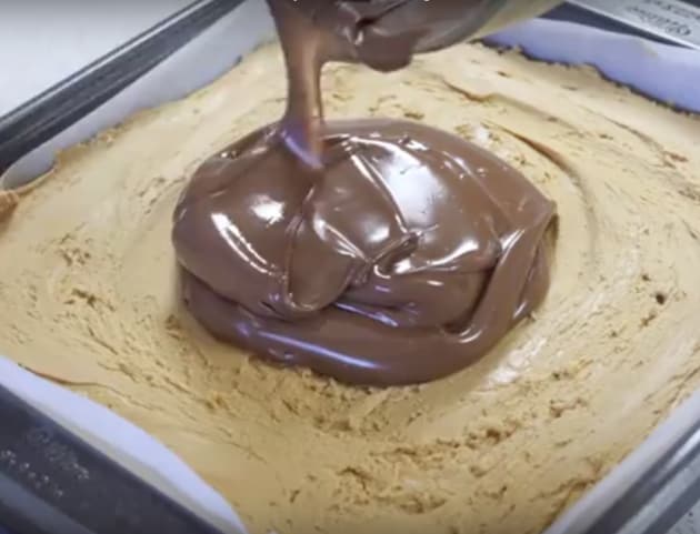 Pouring Melted Chocolate Over Bars