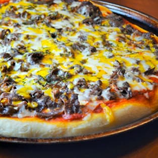 Philly cheesesteak pizza photo