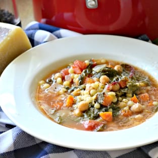 Garbanzo bean vegetable soup with pearled couscous photo