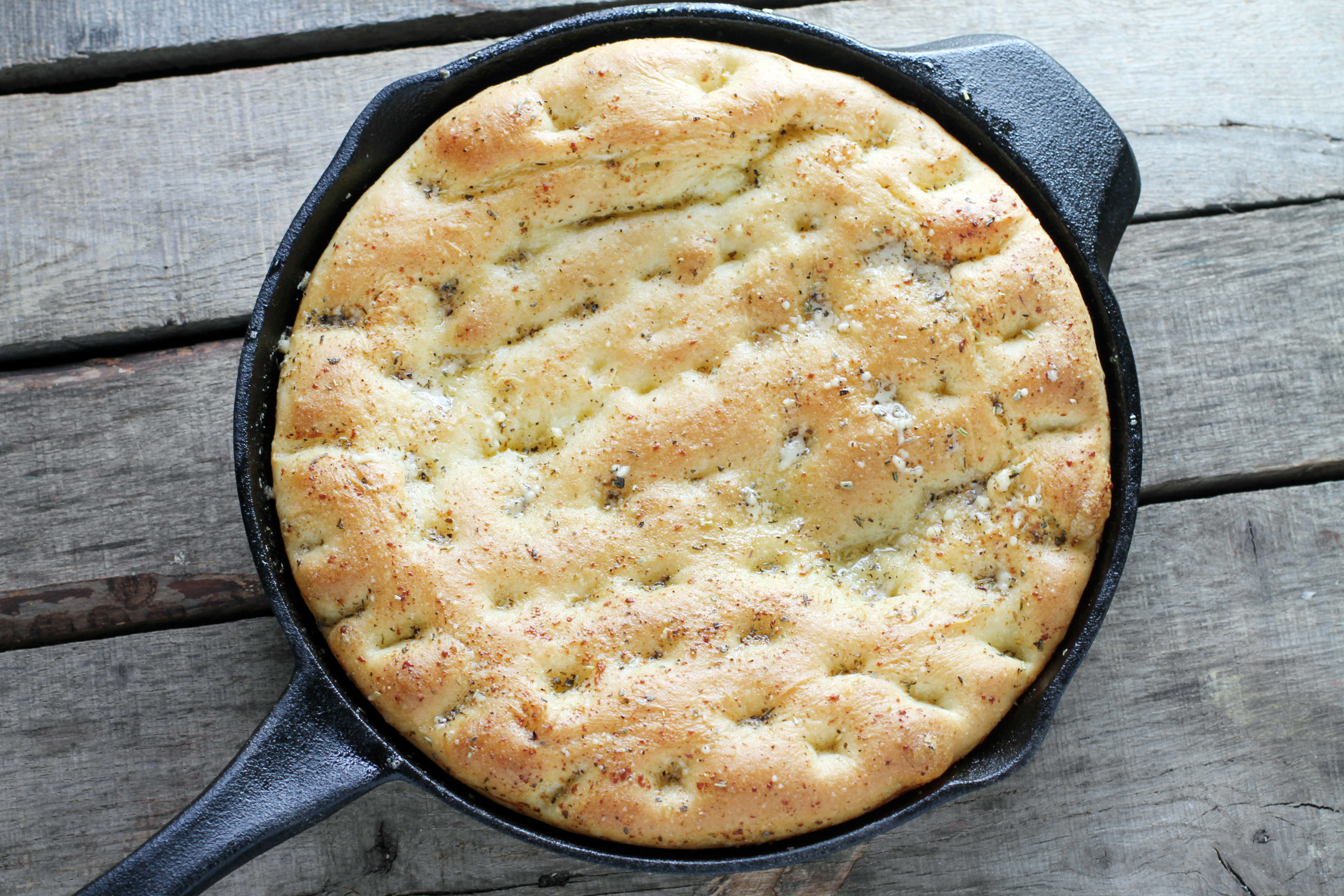 https://food-fanatic-res.cloudinary.com/iu/s--EOWk0pTh--/f_auto,q_auto/v1402705784/easy-focaccia-bread-photo