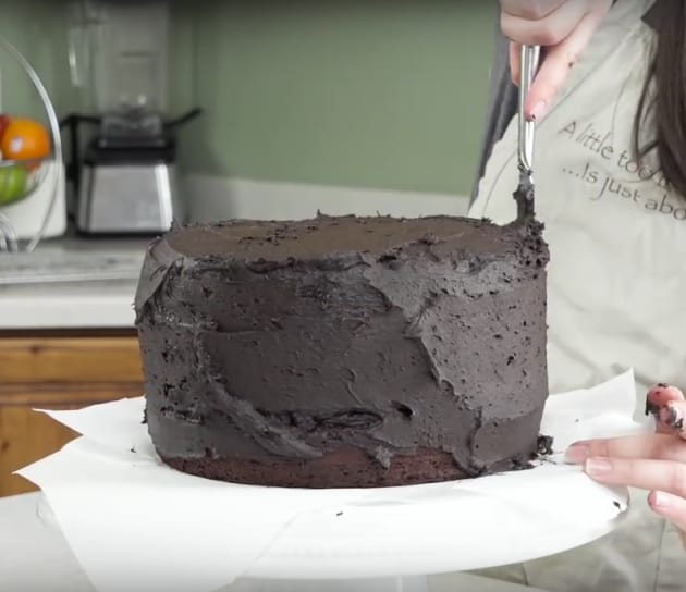 Frosting a Chocolate Cake