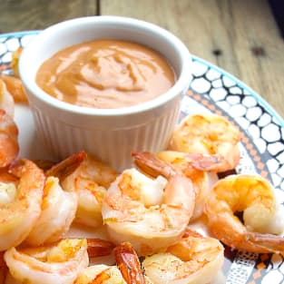 Sauteed garlic shrimp with homemade cocktail sauce image