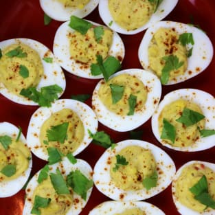 Deviled eggs with yellow lentil hummus photo