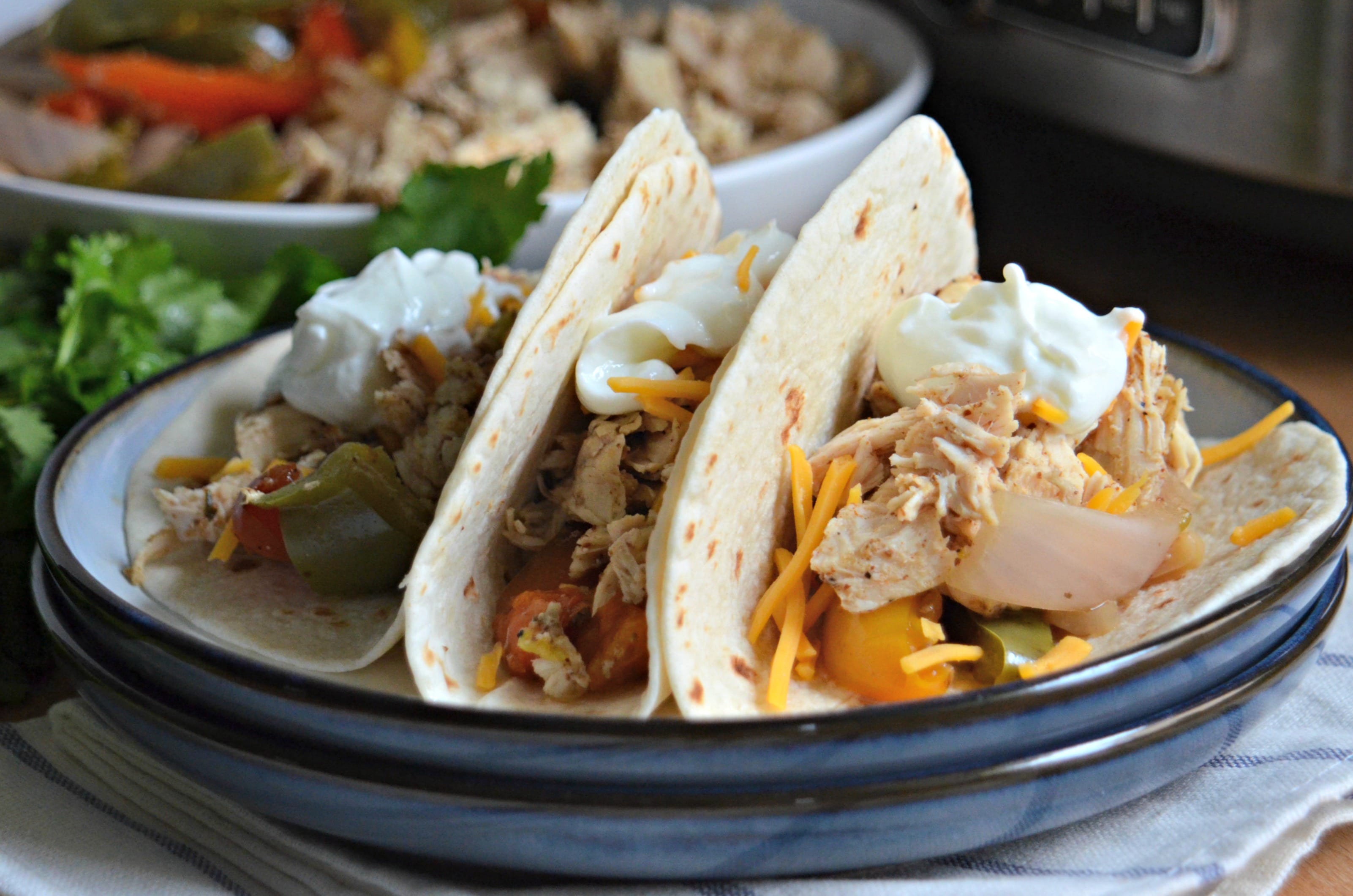 https://food-fanatic-res.cloudinary.com/iu/s--LTjK69yh--/f_auto,q_auto/v1429892706/slow-cooker-chicken-fajitas-photo