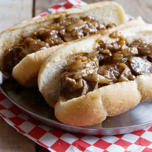Beer brats with mushrooms and onions photo