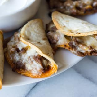 Mini beef and cheese tacos photo
