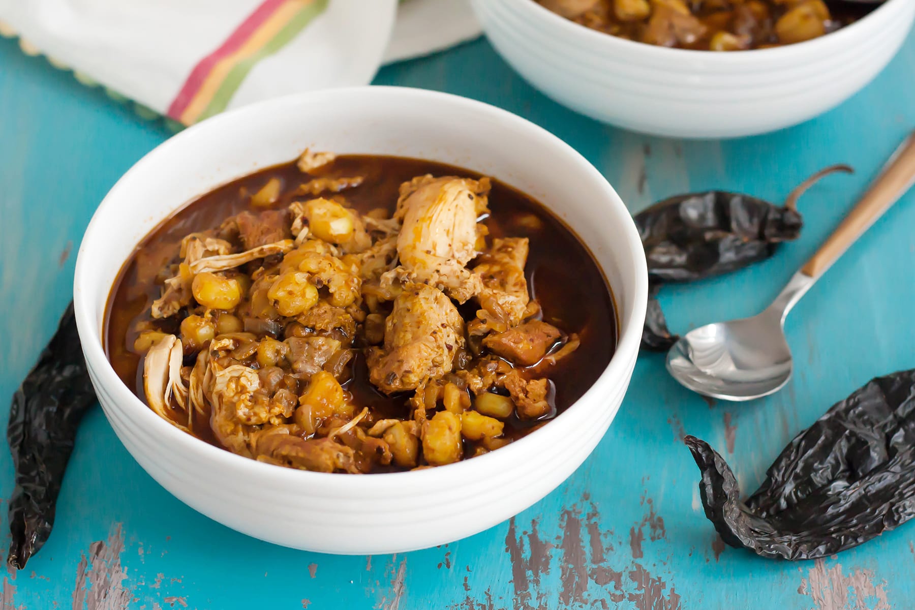 https://food-fanatic-res.cloudinary.com/iu/s--dBOK49Mo--/f_auto,q_auto/v1482416634/chicken-posole-photo