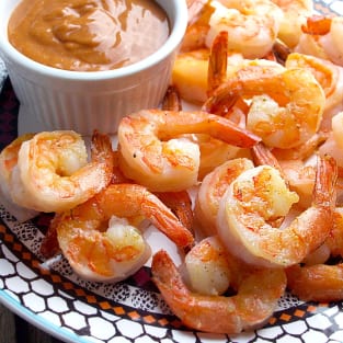 Sauteed garlic shrimp with homemade cocktail sauce photo