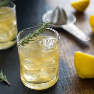 Bourbon sour with lemon and rosemary photo