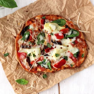 Tortilla pizzas with sundried tomatoes and spinach photo