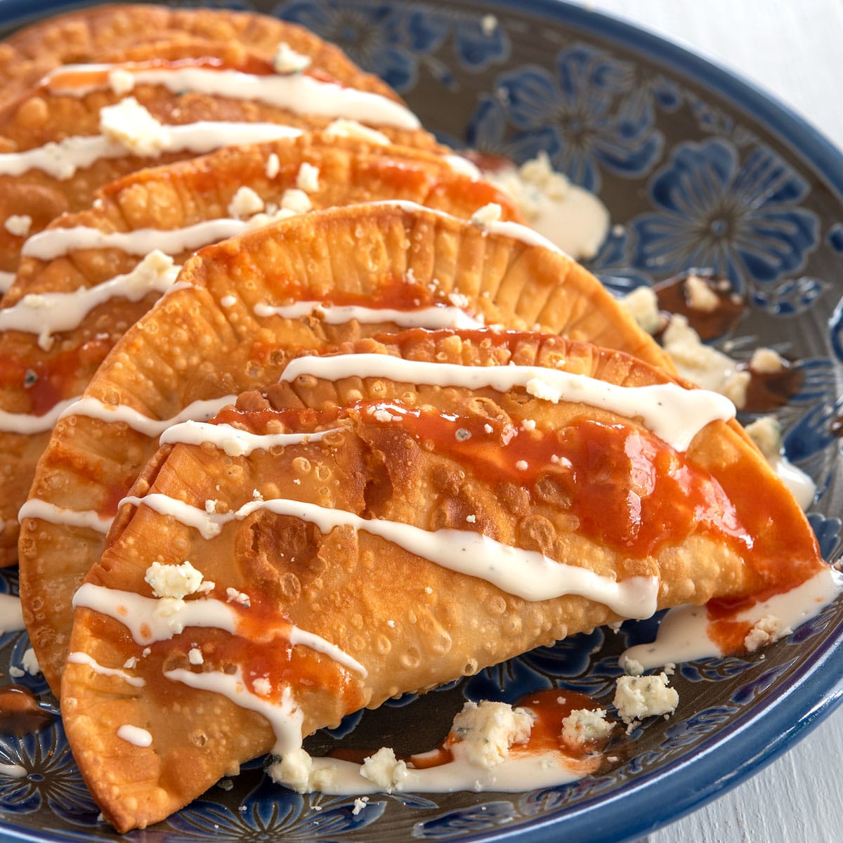 Buffalo Chicken Empanadas Recipe Food Fanatic Great for the superbowl or for any party (or just for yourself…!) when i first started doing my research for this recipe i noticed a lot of other people were adding cream cheese and/or ranch dressing and a. buffalo chicken empanadas recipe