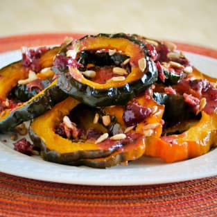 Roasted acorn squash with cranberry sauce photo