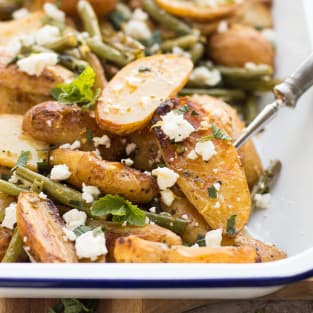 Greek roasted potatoes and green beans photo