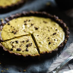 Vegan chocolate tarts with pistachios photo