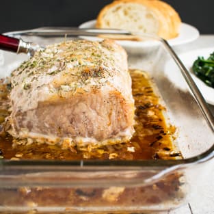 Roasted pork loin with rosemary and garlic photo