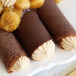 Chocolate crepes with peanut butter marshmallow filling photo